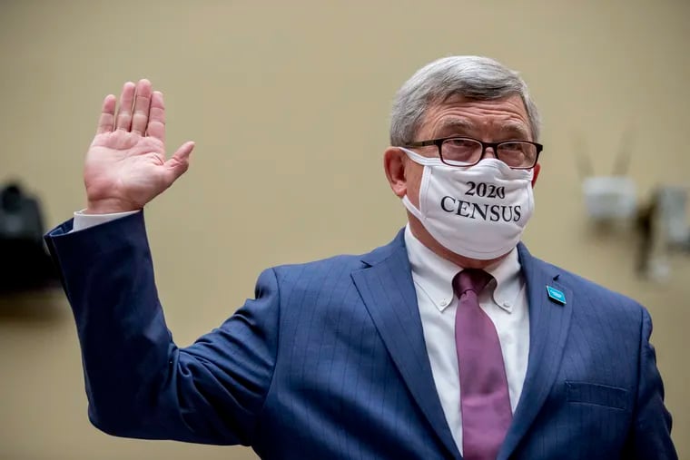 Census Bureau Director Steven Dillingham wears a mask with the words "2020 Census" as he is sworn in to testify before a House Committee on Oversight and Reform hearing on the 2020 Census​ on Capitol Hill, Wednesday, July 29, 2020, in Washington.