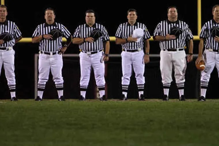 The Scanlan brothers lineup before the high school football game between Springfield and Pottsgrove on Friday night.