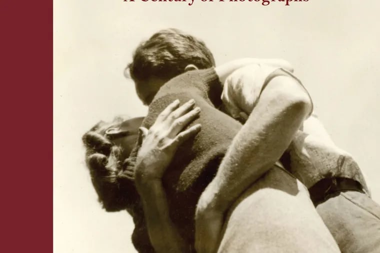 "People Kissing: A Century of Photographs" by Barbara Levine and Paige Ramey. Book cover.