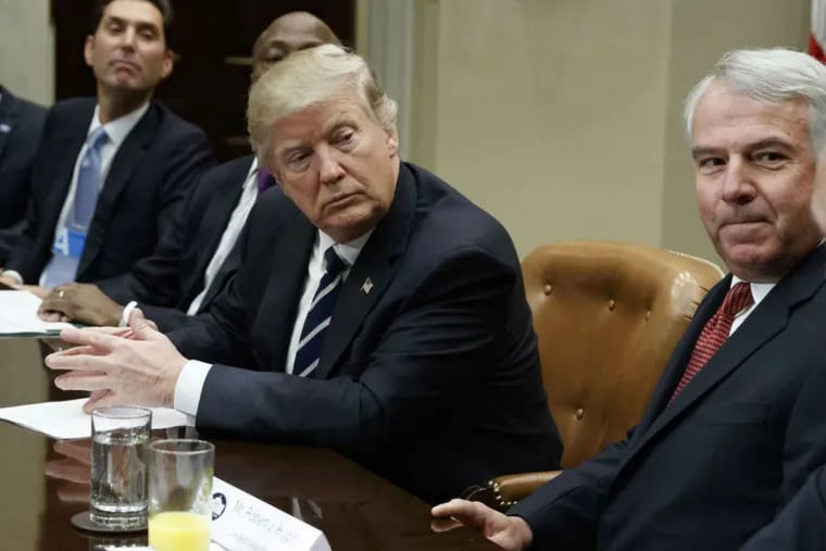 FILE - In this Jan. 31, 2017, file photo, President Donald Trump listens during a meeting with pharmaceutical executives including Celgene Corp.'s Executive Chairman Bob Hugin, second from right, in the Roosevelt Room of the White House in Washington. Hugin, who retired from the pharmaceutical firm on Monday, Feb. 5, 2018, announced in a Monday, Feb. 12, 2018, email he will challenge the re-election bid of U.S. Sen. Bob Menendez, D-N.J., by competing for the Republican nomination in New Jersey's Tuesday, June 5, 2018, primary against technology consultant Richard Pezzullo.