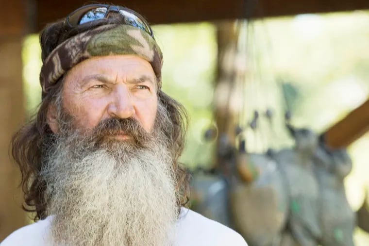 This undated image released by A&E shows Phil Robertson from the popular series "Duck Dynasty." Robertson was suspended last week for disparaging comments he made to GQ magazine about gay people. (AP Photo/A&E, Zach Dilgard)
