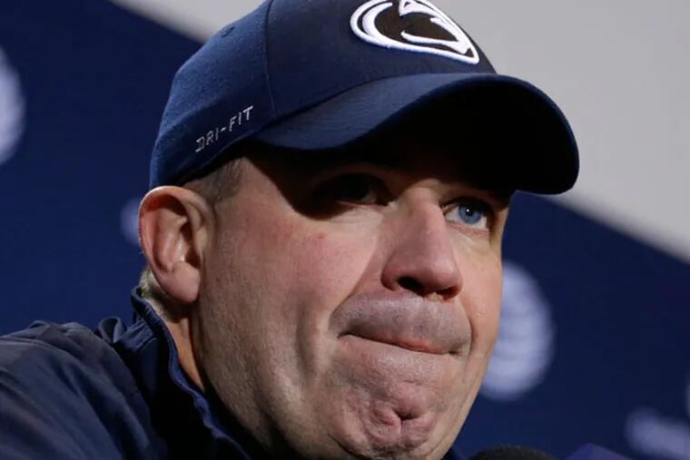 Penn State head coach Bill O' Brien listens to a question during his post-game press conference after a 23-20 loss to Nebraska in overtime of an NCAA college football game in State College, Pa., Saturday, Nov. 23, 2013. (Gene J. Puskar/AP)