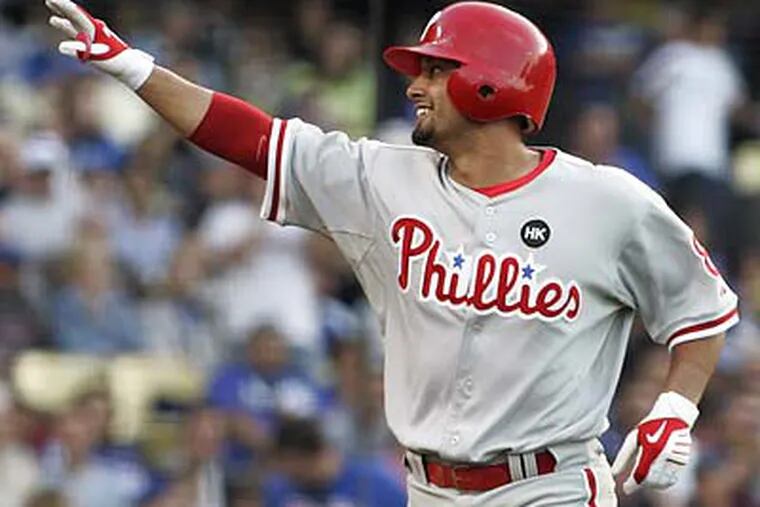 Shane Victorino and the Phillies had reason to smile after last night's win. (Lori Shepler / AP)