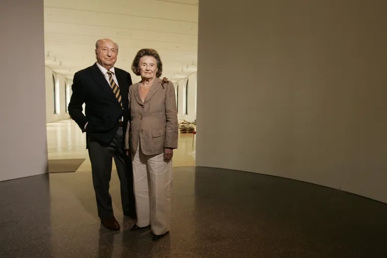 Raymond and Ruth Perelman stand in the entrance way to the exhibition gallery at the Philadelphia Museum of Art's Ruth and Raymond G. Perelman Building.