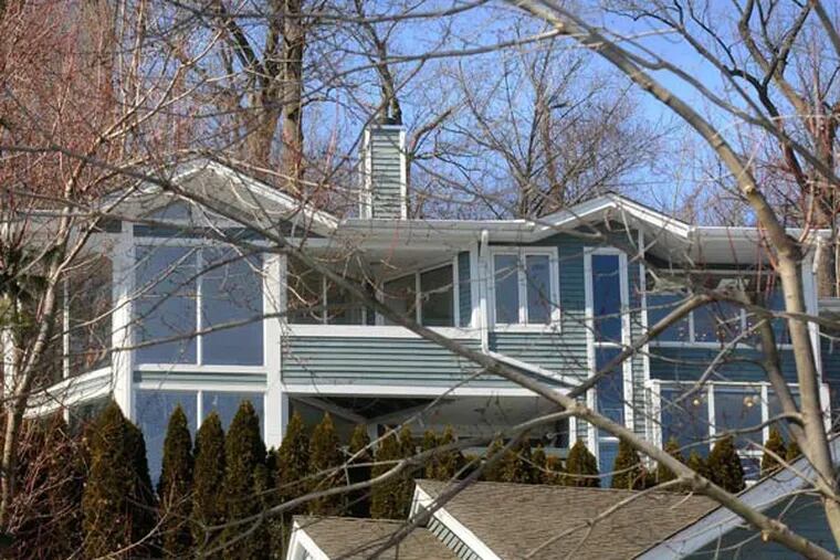 This town house on Garret Mountain in Clifton is priced about three times above the typical listing for the city. It includes multiple decks with views as far as the New York skyline and a room with a small indoor pool. (Carmine Galasso/The Record/MCT)