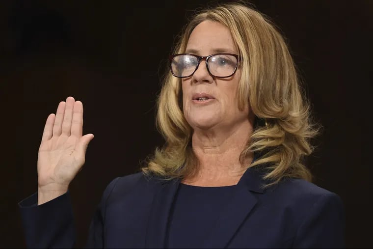 Christine Blasey Ford is sworn in to testify before the Senate Judiciary Committee on Capitol Hill on Thursday.