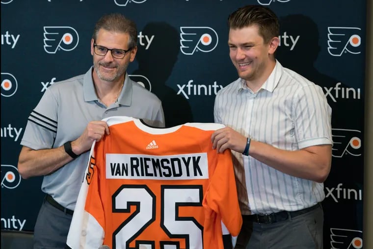 General manager Ron Hextall and recent acquisition James van Riemsdyk at the Skate Zone on Wednesday.
