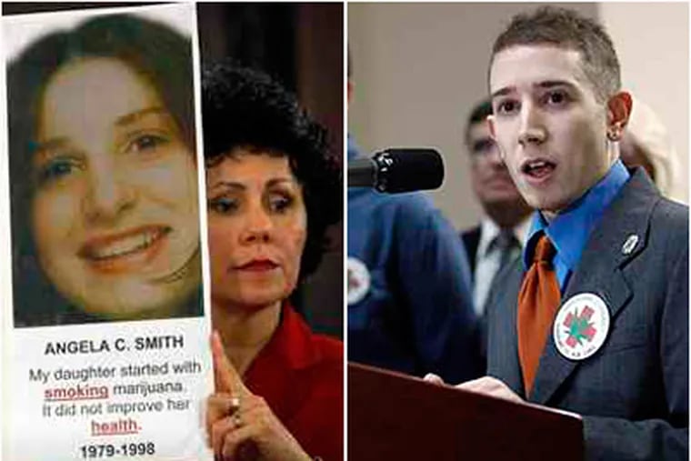 Martha King, left, holds a poster of Angela C. Smith, whose mother, Sharon, spoke of a pot-heroin link. At right, Derek Rosenzweig of the Philadelphia chapter of the National Organization for the Reform of Marijuana Laws addresses a Harrisburg news conference. (Carolyn Kaster / Associated Press)