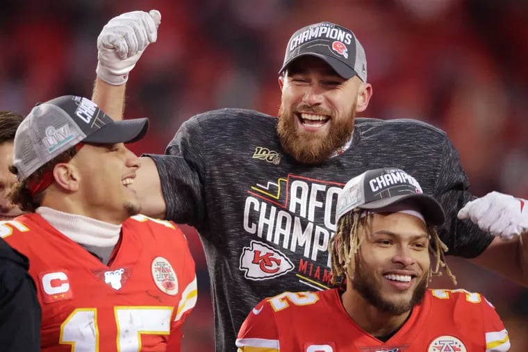Kansas City Chiefs (from left) Patrick Mahomes, Travis Kelce, and Tyrann Mathieu celebrate their victory in the AFC championship game.