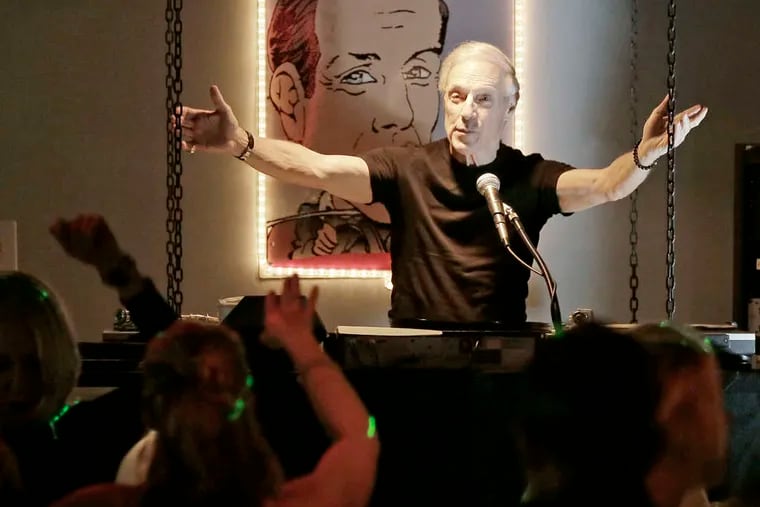 Jerry Blavat acknowledging the dance crowd as he spins at Memories in Margate in 2019.