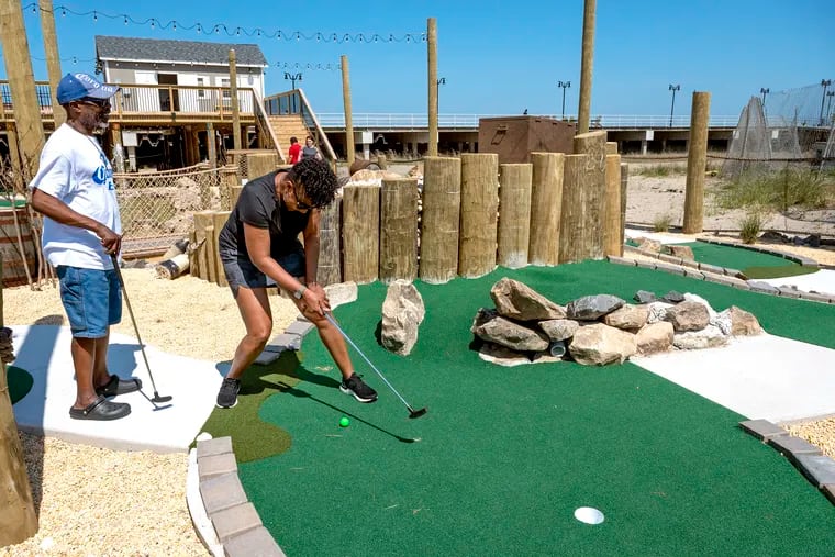 Arthur and Gayle Taylor of Galloway Township play at North Beach Mini Golf in Atlantic City earlier this month.