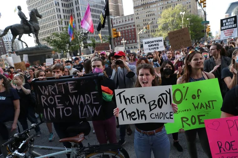 Protesters at Philadelphia's City Hall on Tuesday, May 3, 2022, the day after a leaked Supreme Court draft opinion indicated the court was poised to overturn Roe v. Wade.