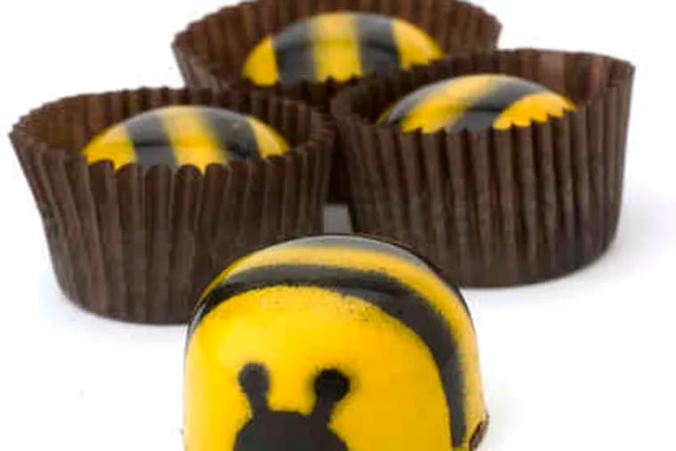 The young lady who sold us these bees said one repeat customer confesses they make her "knees go wobbly." That's close to the typical reaction: The handcrafted bees are delicate shells of dark Valrhona ganache filled with oozy salted caramel and basswood honey from an upstate Pennsylvania farm.