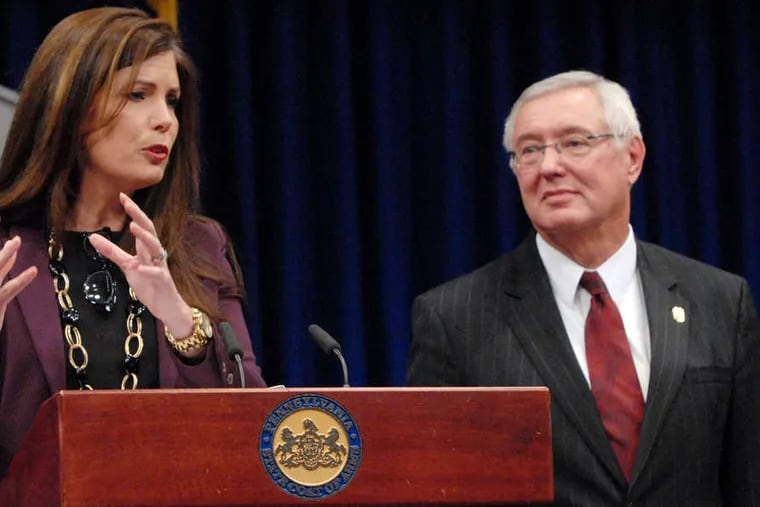 Pa. Attorney General Kathleen Kane and State Police Commissioner Frank Noonan announce the charges.