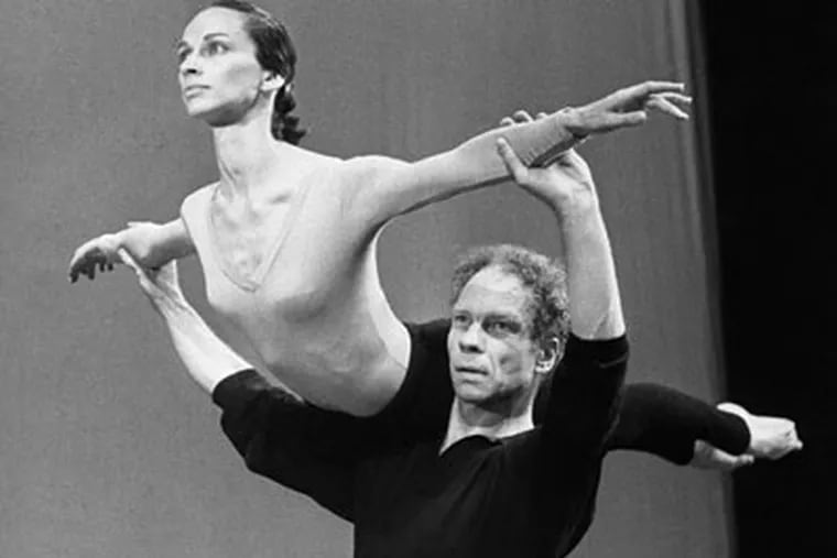 In this July 27, 1964, file photo, Merce Cunningham lifts Carolyn Brown during rehearsal at Sadler Wells Theater in London. Cunningham died on Sunday, July 26, 2009. (AP Photo, File)