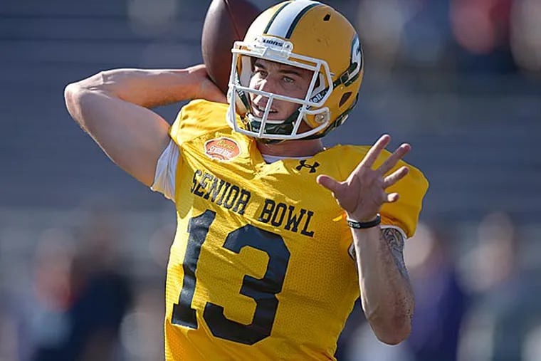 South squad quarterback Bryan Bennett of Southeastern Louisiana (13) drops back to pass during Senior Bowl South squad practice at Ladd-Peebles Stadium. (Glenn Andrews/USA Today)