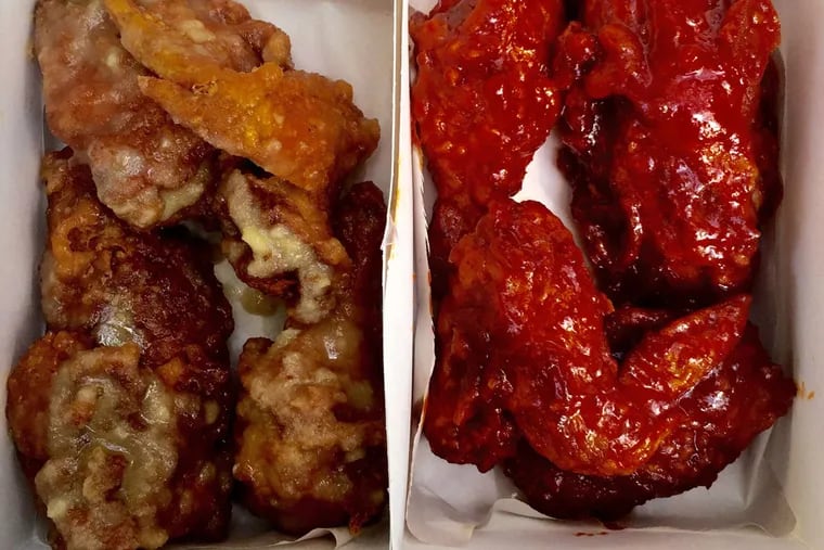 Korean fried chicken with sweet chili and honey garlic sauces, from Andy's Chicken in Fishtown. ( Craig LaBan / Staff )