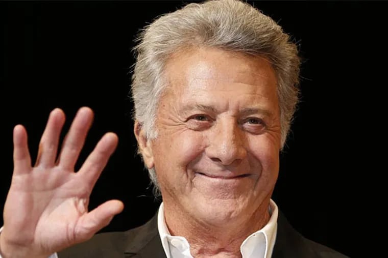 FILE - In this April 8, 2013 file photo, actor Dustin Hoffman waves to fans during the Japan Premiere of his film, "Quartet,"  in Tokyo. A spokeswoman for the 75-year-old actor-director confirmed a People.com report Tuesday, Aug. 6, 2013, that says Hoffman is in good health after undergoing surgical treatment for cancer. (AP Photo/Koji Sasahara, File)