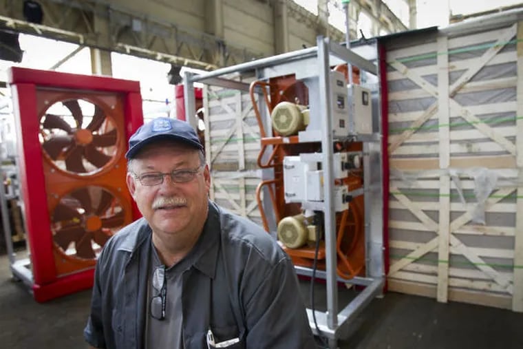 Jim Still, president of Media-based Global Cooling , with the machine he developed. (Alejandro A. Alvarez / Staff Photographer)