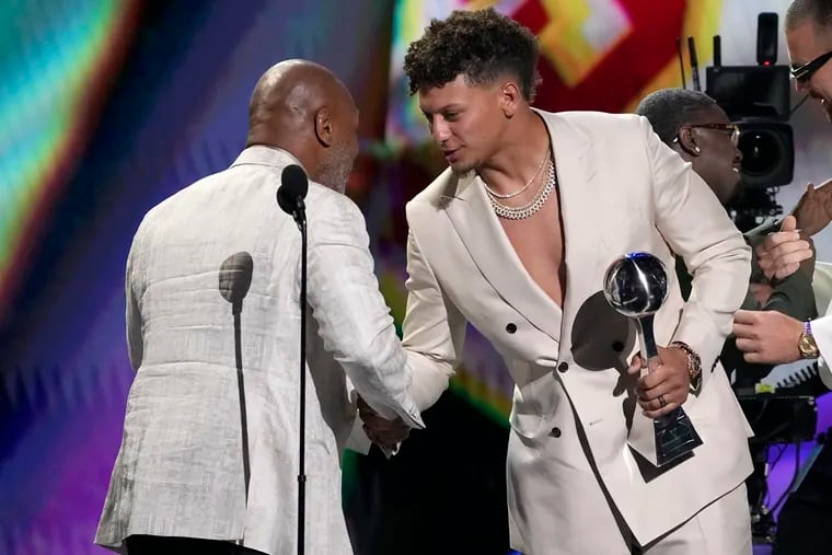 Mike Tyson presents the award for best team to professional NFL football player Patrick Mahomes, of the Kansas City Chiefs at the ESPY awards on Wednesday, July 12, 2023, at the Dolby Theatre in Los Angeles.