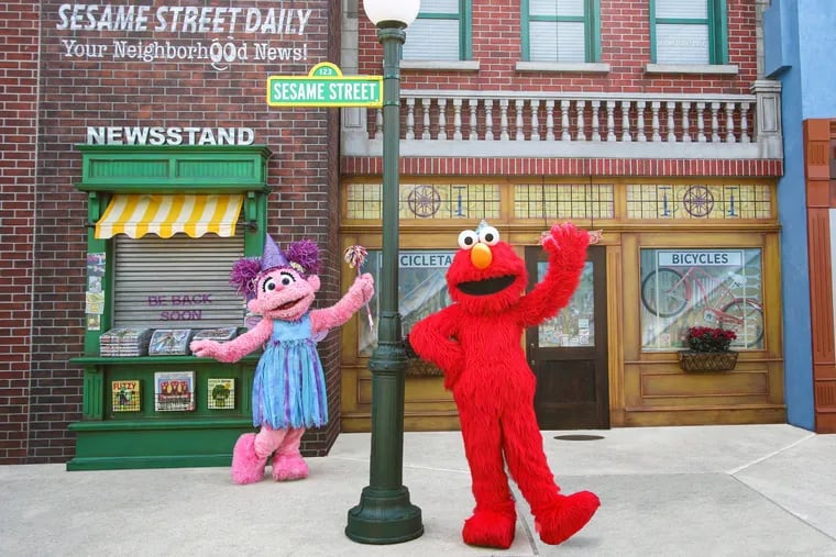 Sesame Place, which has reopened, requires guests ages 2 and up to wear masks. Abby and Elmo (pictured) don't have to.