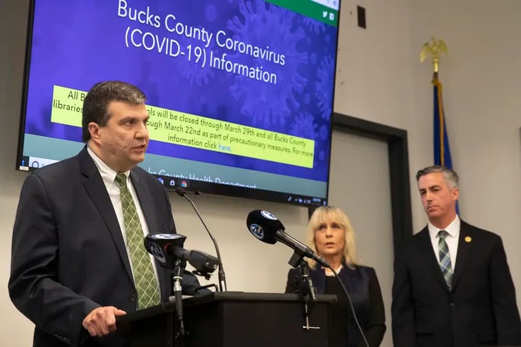 Bucks County Emergency Services Director Scott T. Forster speaks at a March 14 news briefing about the coroanvirus with Chair of the Bucks County Commissioners, Diane Ellis-Marseglia and Vice Chair Bob Harvie, Jr. (right).