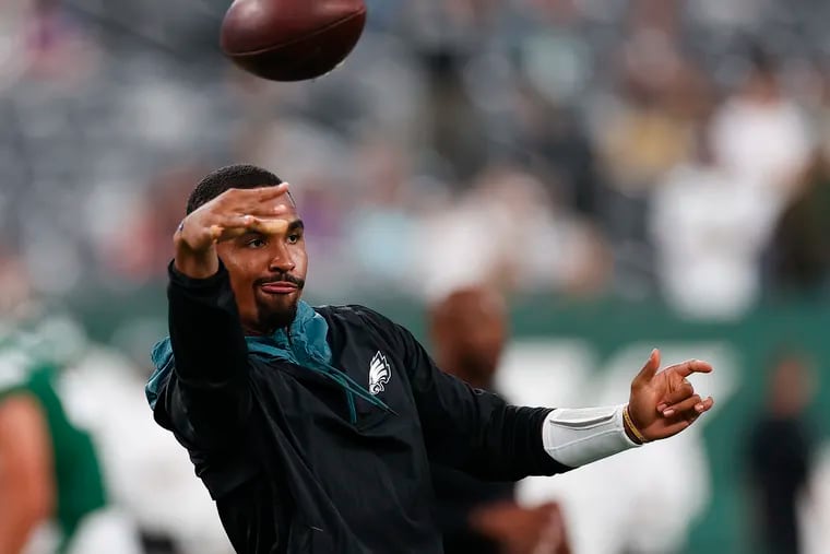 Jalen Hurts throwing the football during warm-ups before the Eagles played at the New York Jets.