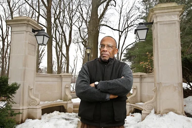 William Earle Williams, a professor at Haverford College, by the school’s Edward B. Conklin Memorial gates, which were designed by Julian Abele. Williams’ research has revived interest in Abele’s public architecture.