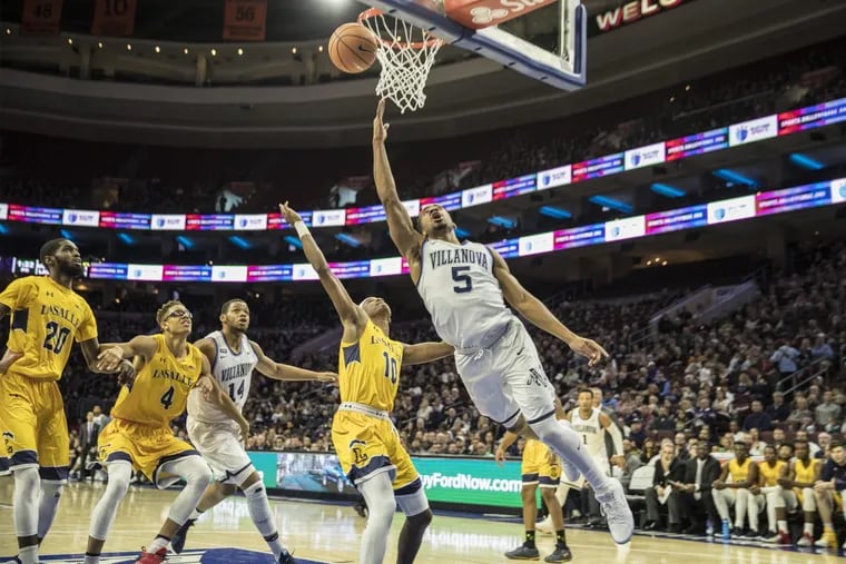 Villanova’s Phil Booth, drives for a backdoor layup in the Wildcats’ win over La Salle.