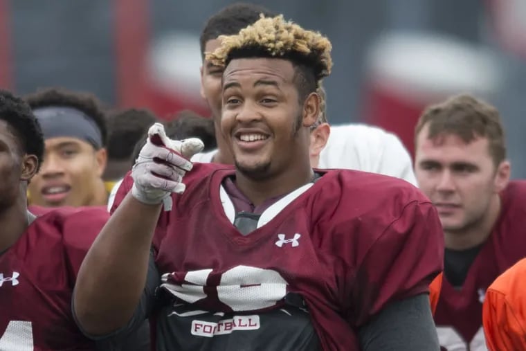 Temple offensive lineman Dion Dawkins has defied the odds to be a strong force in the Owls' running game.