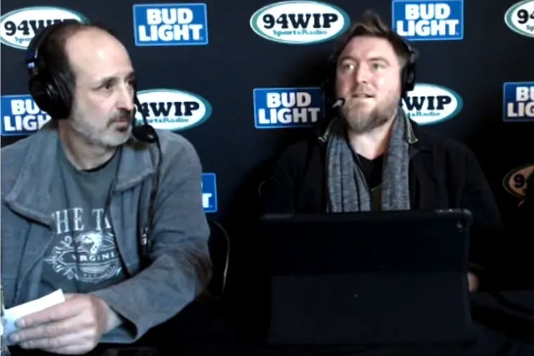 Longtime 94.1 WIP host Rob Charry (left), seen here in 2018 alongside Jon Ritchie, returned to the station Monday night after being let go in April 2020 due to pandemic cuts.