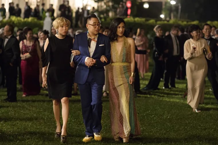 Awkwafina, from left, Nico Santos and Constance Wu in a scene from the film "Crazy Rich Asians."