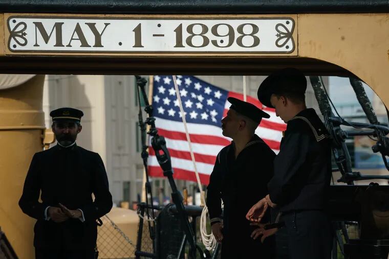 Members of the living history group with the independent seaport museum on the Cruiser Olympia, as the Independence Seaport Museum (ISM) commemorated the Centennial Anniversary of the Return of the Unknown Soldier on Cruiser Olympia, in Philadelphia, on Monday.