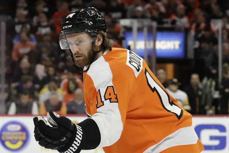 Flyers center Sean Couturier, who was sidelined Wednesday because of an apparent knee injury, was named a Selke finalist.