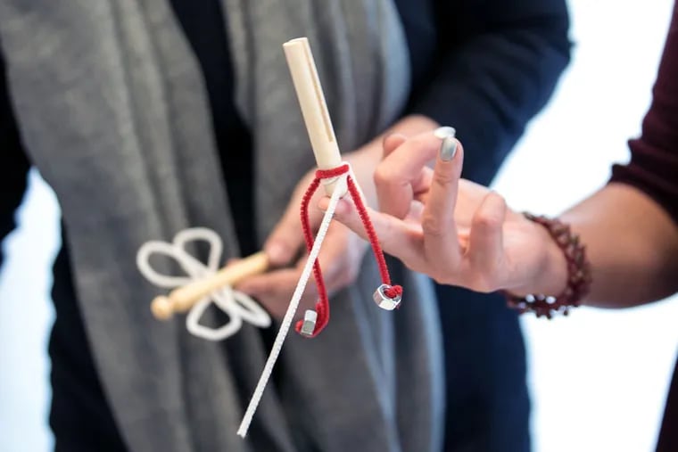By learning the key forces of balance, learn how to create a kinetic sculpture that moves atop your finger.