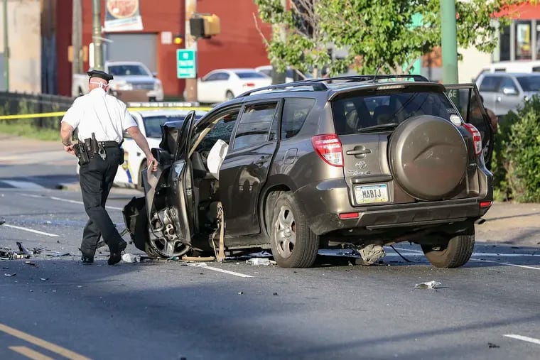 Philadelphia Police investigate a fatal crash in the 6200 block of Frankford Avenue where a 3-year-old died who was traveling in this Toyota Rav4, Wednesday,  May 27, 2020