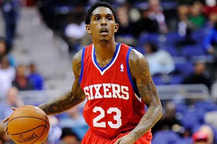 Sixers guard Lou Williams' work in the community may have stopped him from being robbed at gunpoint. (Nick Wass/AP)