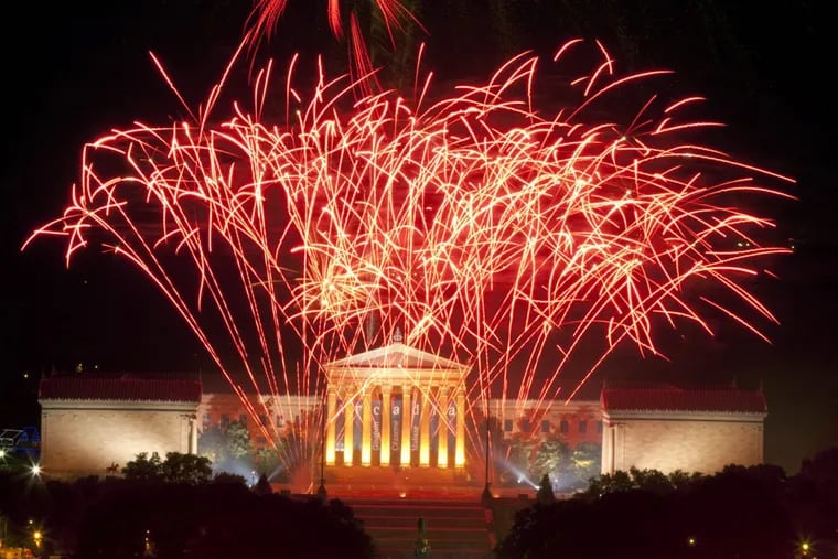 Fireworks explode over the Philadelphia Museum of Art on the Benjamin Franklin Parkway.