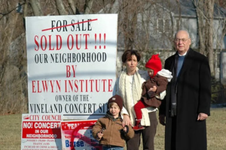 Pete Steenland, his daughter, Joy Marion, and her children, near the entrance of the proposed festival site. They are among some of Vineland&#0039;s vocal residents who oppose the concert.