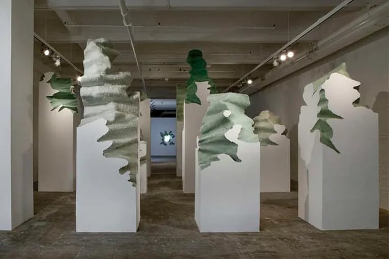Daniel Arsham's &quot;Columns,&quot; front, evoke his theme of architectural destruction informed by his experience of Hurricane Andrew in 1992. At rear is &quot;Storm,&quot; a wall cavity with a motion sensor that triggers storm sounds and bursts of light.