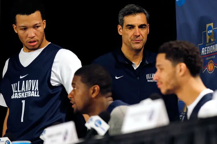 Villanova coach Jay Wright walks into a press conference with players (from left) Jalen Brunson, Kris Jenkins and Josh Hart at the KFC Yum! Center in Louisville, KY on Friday, March 25, 2016.