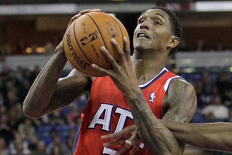 Former Sixer Lou Williams is averaging 15.1 points per game with the Atlanta Hawks. (Rich Pedroncelli/AP file)