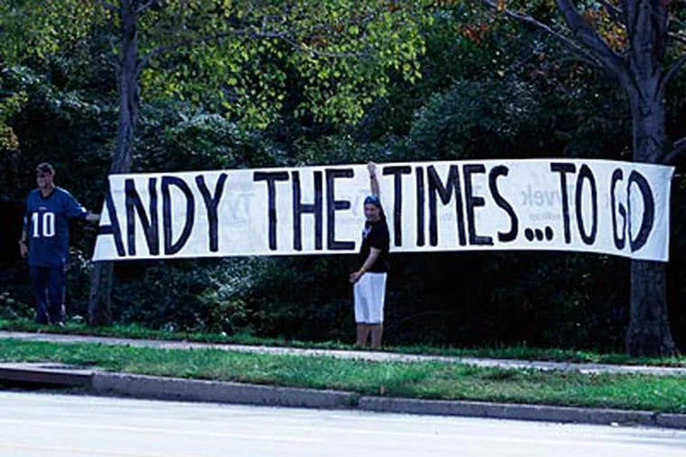 Disgruntled fans put up a sign outside of the NovaCare Complex calling for Andy Reid's dismissal. (Ashlee Espinal/Staff Photographer)