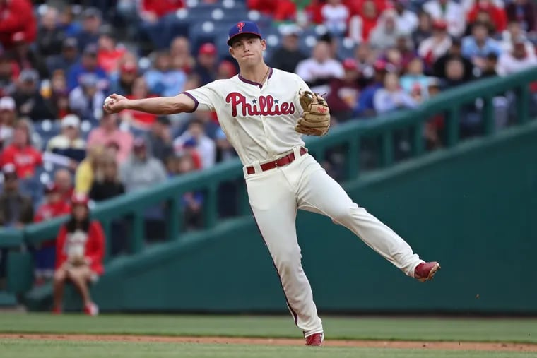 Phillies short stop Scott Kingery fields the grounder hit by New York Met Travis dâ€™Arnaud and throws him out at first in the fifth inning. The Philadelphia Phillies play the New York Mets on April 17, 2019 at Citizen Bank Park.   MICHAEL BRYANT / Staff Photographer