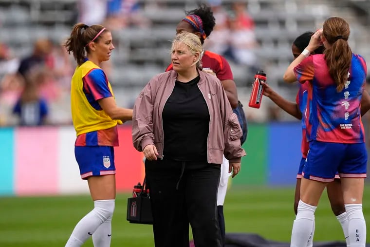 New U.S. women's soccer team manager Emma Hayes (center) has some big decision to make about who should be on the Olympic team, including superstar striker Alex Morgan.