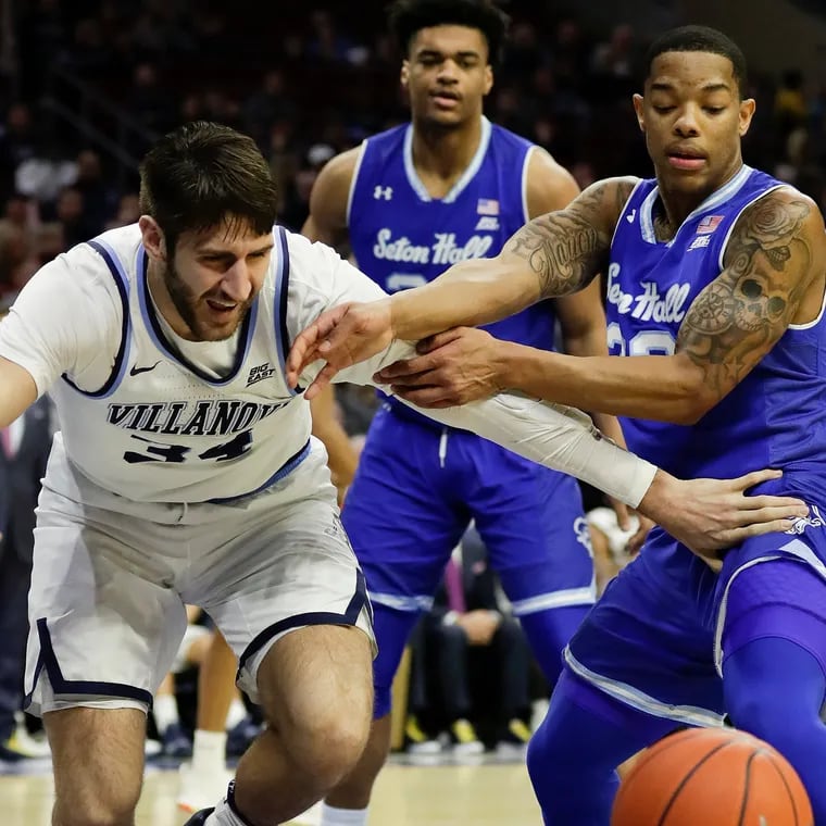 Former Villanova forward Tim Delaney (left) is working his way back, trying to make the pro ranks after having hip replacement surgery.