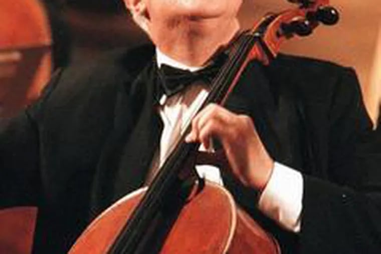 Mstislav Rostropovich plays at a 1998 memorial in Moscow for his friend Alexander Solzhenitsyn.