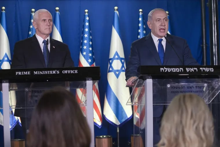 U.S. Vice President Mike Pence, left, listens as Israel’s Prime Minister Benjamin Netanyahu delivers a statement in the Prime Minister’s residence in Jerusalem, Monday, Jan. 22, 2018.