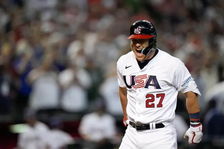 Mike Trout celebrates his three-run home run against Canada during the first inning of a World Baseball Classic game in Phoenix.