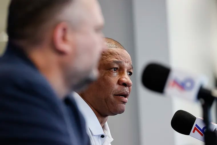 Sixers coach Doc Rivers answering questions with team president Daryl Morey at the Sixers Training Complex  in Camden on Friday.
